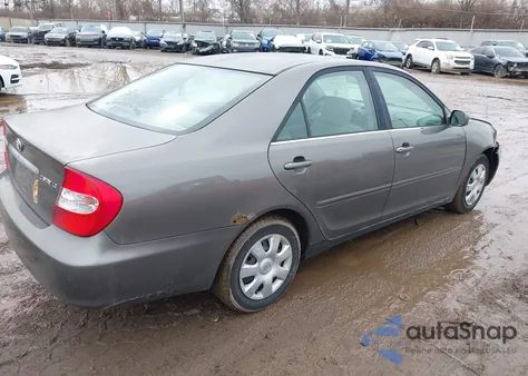 2003 Toyota Camry Le z USA, uszkodzony, nr VIN 4T1BE32K83U768702